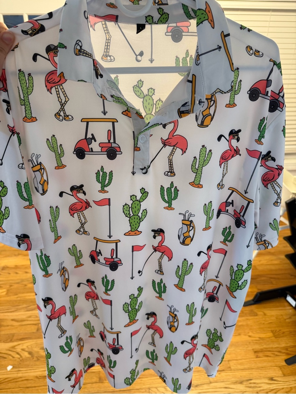 Amazon White Flamingo Polo with Green Cactus and Orange Accents